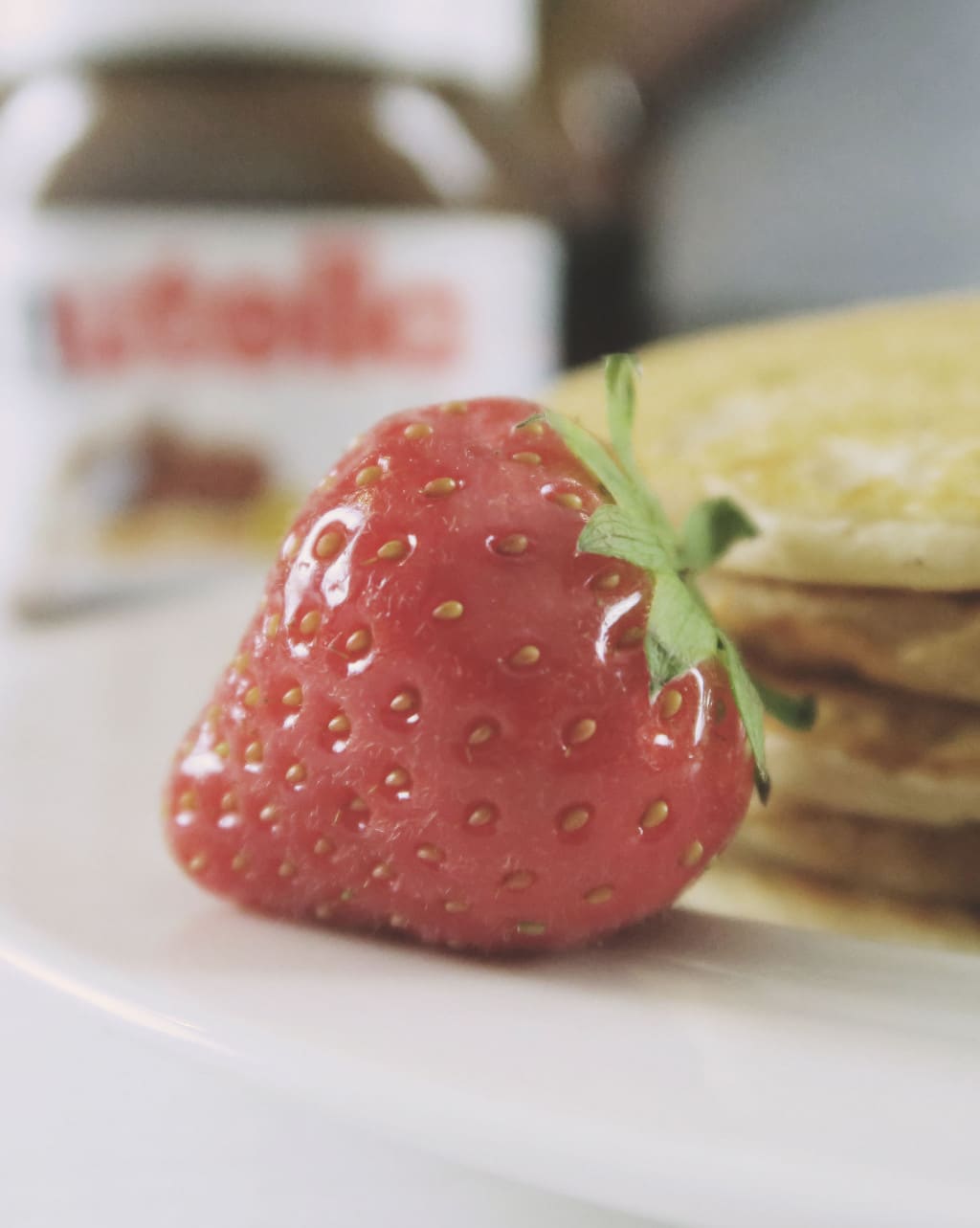 The Best Eggless Pancake Recipe EVER {Featuring Nutella} — strawberry close up