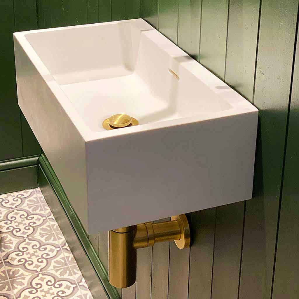 Downstairs loo makeover — small rectangular sink with brushed brass fittings